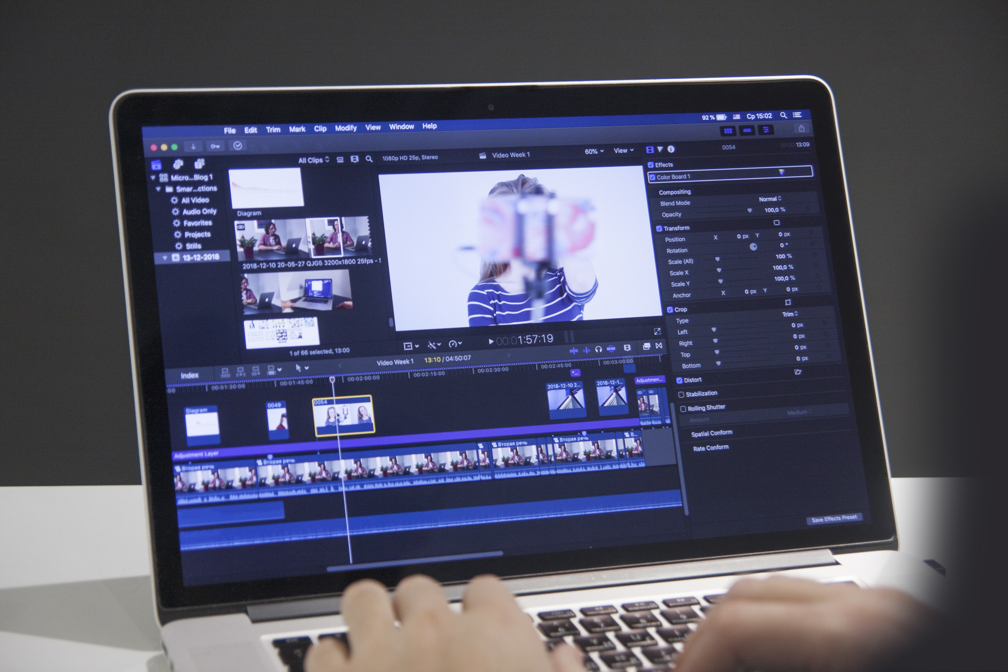 Video editing with laptop. Professional editor adding special effects or color grading footage for commercial film or movie.